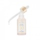 A luxurious ampoule infused with a 24K gold flake to